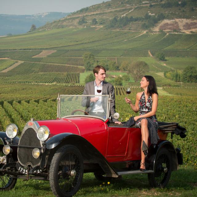 Couple seated on Bugatti Vineyard tasting Route Des Grands Crus