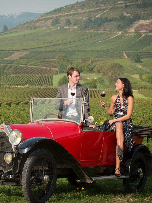 Couple seated on Bugatti Vineyard tasting Route Des Grands Crus